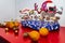 Candy`s, oranges, nuts and Christmas party masks