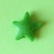 Candy star green on a background of similar analogous colors