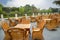 Cane chairs and wood teatable at riverside,Chengdu