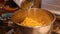 Canned Corn being poured into pan for cooking