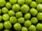 Canned green peas or chickpeas close-up. Macro shooting. Food background