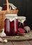 Canned kidney bean in tomato paste in glass plastic free jar on rustic table, closeup, canned produce concept