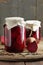 Canned kidney bean in tomato paste in glass plastic free jar on rustic table, closeup, canned produce concept