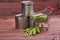 Canned peas and fresh peas in shopping trolley.