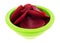 Canned sliced beets in a small green bowl isolated on a white background