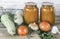 Canned squash caviar with vegetables in glass jars.