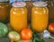 Canned squash caviar with vegetables in glass jars.