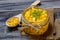 Canned sweet corn in wooden background