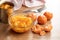 Canned tangerine. Pickled mandarin fruit in bowl on wooden table