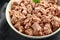 Canned tuna fish in white bowl with omega 3