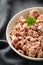Canned tuna fish in white bowl with omega 3