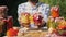 Canned vegetables in glass jars in the hands