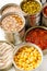 Canned vegetables in tins, close-up. Long shelf life food