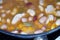 Canned white giant beans cooked in a pan with macro lens photographed