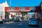 Cannery Row street with historic elevated bridges. Cars parked along the famous tourist destination. - Monterey, California, USA