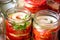 Canning fresh tomatoes with onions for winter in jelly marinade