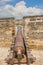 Cannon on the fortified walls of Cartagena de Indias in Colombia