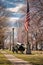 cannon in a historic military park with american flag at half-mast