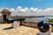 Cannons at Fort of Saint Charles and cruise ship in Havana
