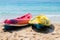 Canoe on the blue sea. Yellow and blue kayaks on the beach on a sunny day. Sports summer hobby, passion Background. There is a