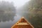 Canoe Bow on a Misty Autumn River