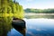 a canoe docked on a tranquil lake