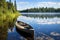 a canoe docked on a tranquil lake