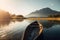 Canoe floating on a serene mountain lake surrounded by tall pine trees on a peaceful morning