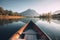 Canoe floating on a serene mountain lake surrounded by tall pine trees on a peaceful morning