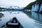 Canoe among icebergs in Valdez Glacier Lake, Alaska