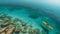 Canoe kayak in infinite clear turquoise blue transparent Sea, aerial drone top view. Summer vacation fun, relax and