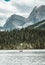 A canoe on maligne lake in summer with a backdrop of the canadian rockies in jasper national park, alberta, canada