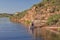 Canoe paddler on a mountain lake