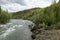 Canoe rapids adventure on wild Alaskan river