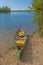 Canoe Ready on a Calm Lakeshore
