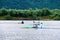 Canoe rowers on river