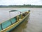 Canoe taxi on river in jungle
