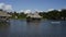 Canoe with tourists crosses the lagoon El Milagro, July 2016.Tingo Maria, Peru