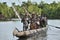 Canoe war ceremony of Asmat people. Headhunters of a tribe of Asmat . New Guinea Island, Indonesia. June 28 2012