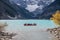 Canoeing on turquoise louise lake in Banff National park, Canada fall