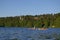 Canoeist on scenic lake