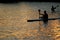 Canoeists paddling on lake