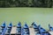 Canoes anchored at harbour in green river. Maremma, Tuscany, Italy