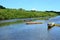 canoes floating on river in Latin america