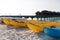 Canoes or kayaks mooring on sandy beach