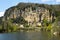 Canoes pass La Roque-Gageac on the Dordogne River