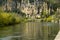 Canoes pass La Roque-Gageac on the Dordogne River