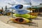 Canoes on racks for sale at a camping store