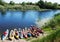 Canoes on a river-bank.