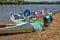 Canoes on the Riverside